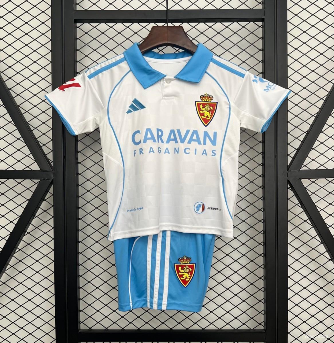 b38c9e170af4cef862abcb2f.jpg 25/26 Kids Real Zaragoza Home Jersey - Image 1